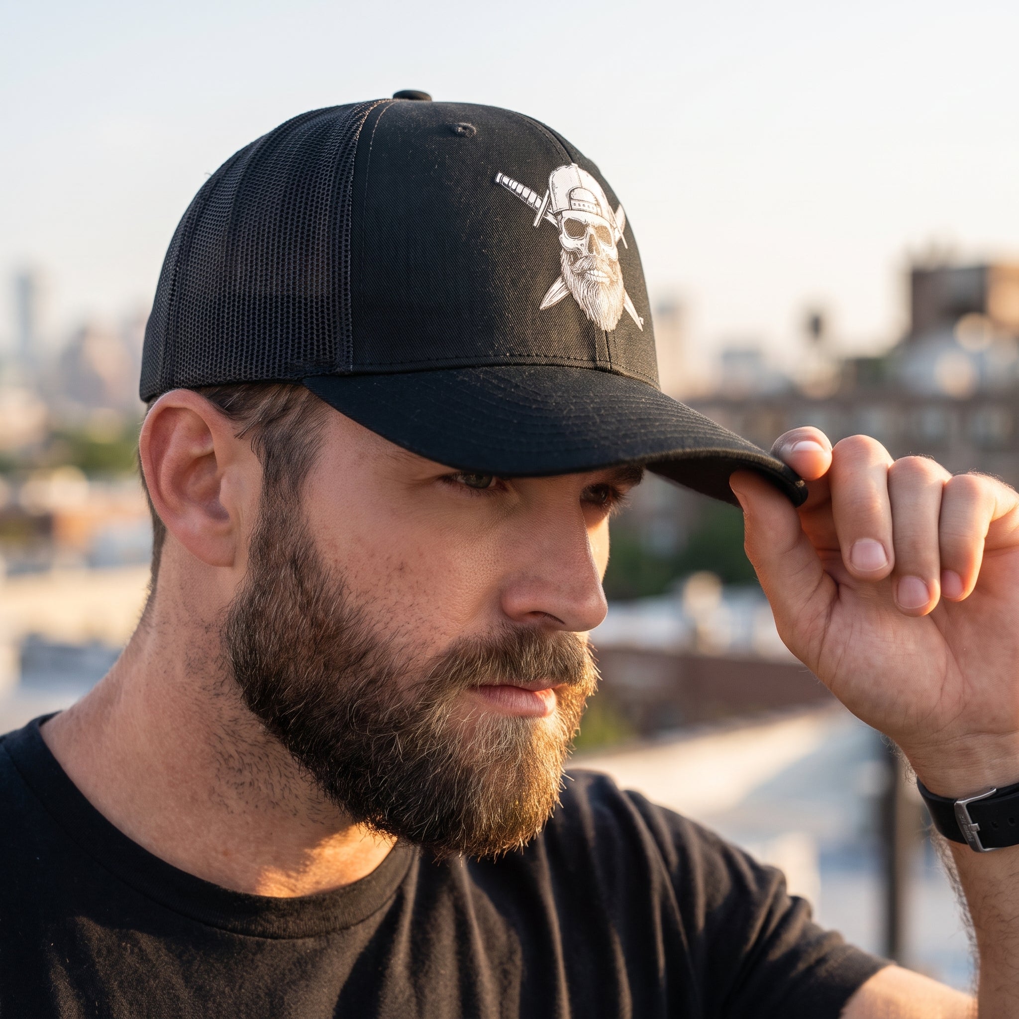 Man wearing the Spec Ops Water Blackout Trucker Hat outdoors.