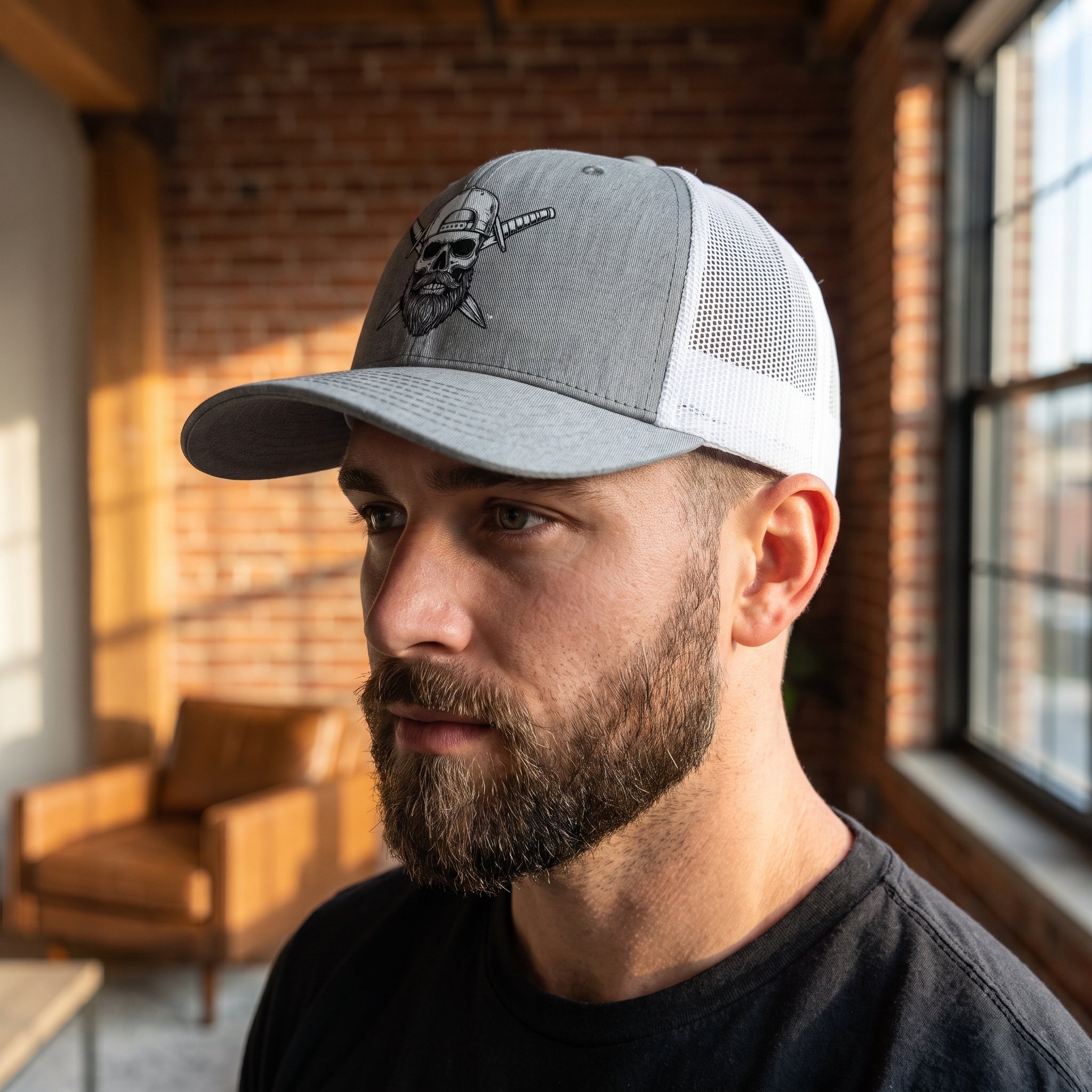 Man wearing the Spec Ops Water FORGED gray and white trucker hat in a casual everyday setting.