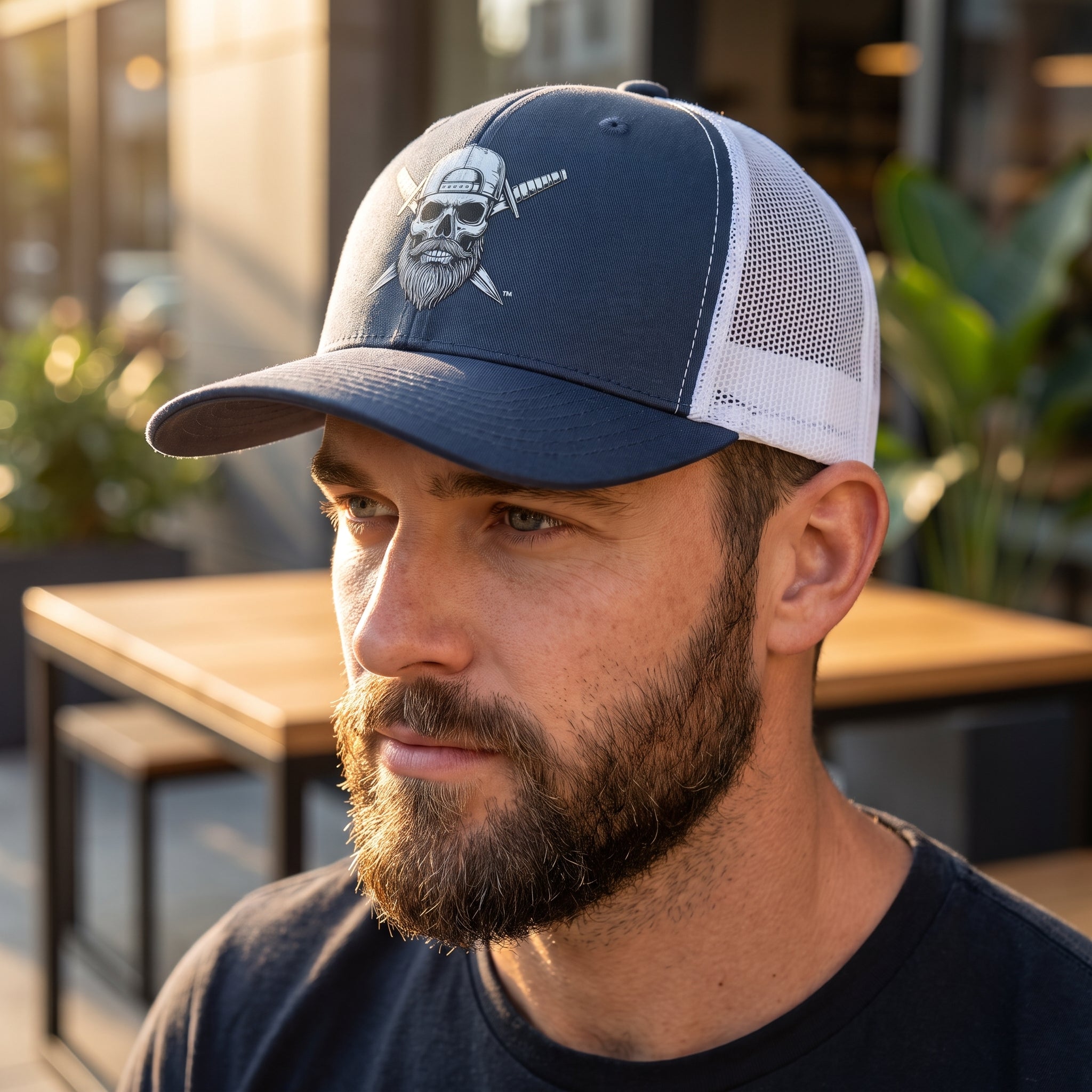 Man wearing the Spec Ops Water HERITAGE navy and white trucker hat outdoors.
